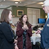 Attendees discussing